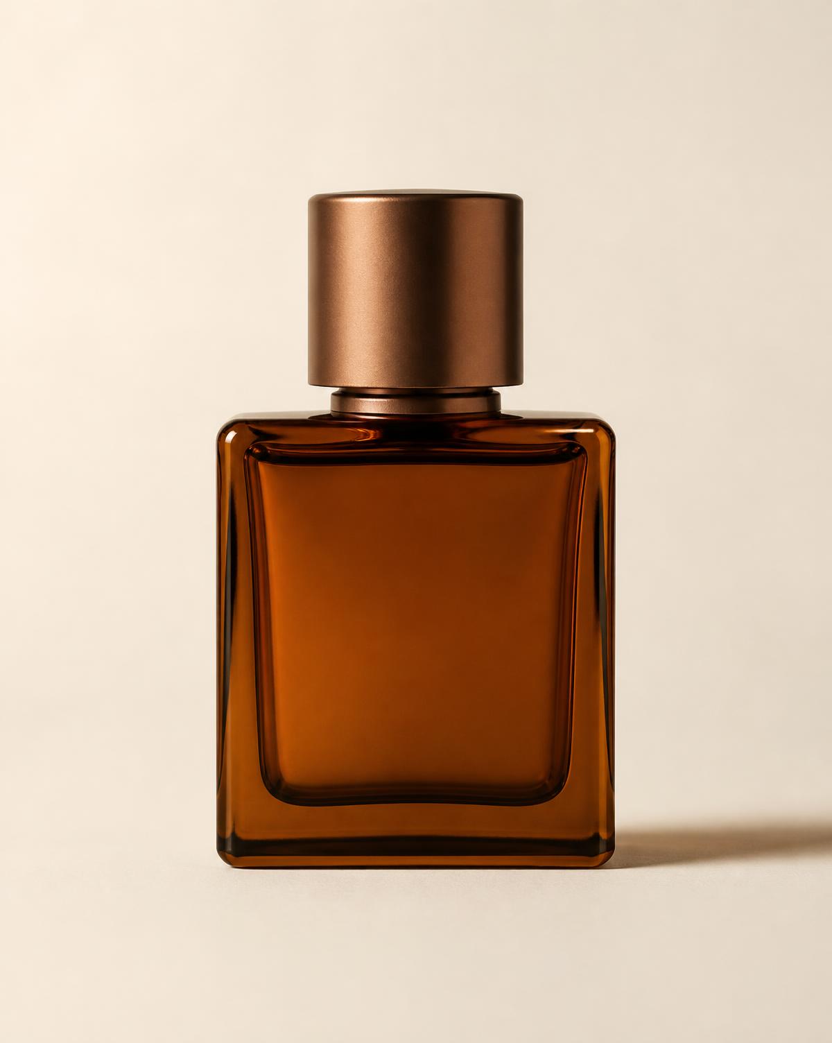 Warm editorial fragrance photography with amber tones